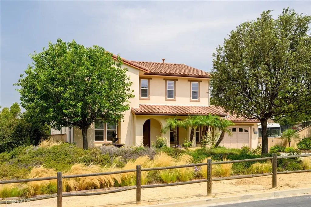A luxury home in Shadow Hills with a large driveway.